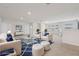 Spacious bonus room features a cozy sitting area at 8833 Corcovado Dr, Kissimmee, FL 34747