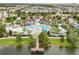 Aerial view of resort-style community pool with waterslide and clubhouse at 8833 Corcovado Dr, Kissimmee, FL 34747