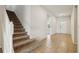 Bright and spacious entryway with staircase leading upstairs at 8833 Corcovado Dr, Kissimmee, FL 34747