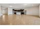 Open concept kitchen with island and stainless steel appliances at 8833 Corcovado Dr, Kissimmee, FL 34747