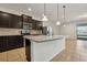 Modern kitchen with granite countertops and stainless steel appliances at 8833 Corcovado Dr, Kissimmee, FL 34747