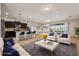Open floor plan boasts a modern kitchen island and Gathering room with water views at 8833 Corcovado Dr, Kissimmee, FL 34747