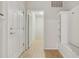 Convenient laundry room with built-in shelving at 8833 Corcovado Dr, Kissimmee, FL 34747