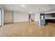 Open-concept living room and kitchen with tile flooring and modern lighting at 8833 Corcovado Dr, Kissimmee, FL 34747
