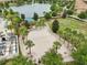 Beach volleyball court with surrounding palm trees at 8833 Corcovado Dr, Kissimmee, FL 34747