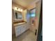 Updated bathroom vanity with granite countertop at 89 Crooked Pine Rd, Port Orange, FL 32128
