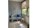 Relaxing sunroom with wicker furniture at 89 Crooked Pine Rd, Port Orange, FL 32128