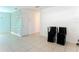 Dining area with geometric accent wall and tile flooring at 911 Shady Park Ter, Daytona Beach, FL 32117