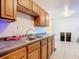 Kitchen with double sink and ample counter space at 911 Shady Park Ter, Daytona Beach, FL 32117