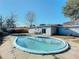 Backyard with kidney-shaped swimming pool at 911 Shady Park Ter, Daytona Beach, FL 32117