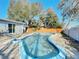 Backyard oasis featuring a kidney-shaped pool at 911 Shady Park Ter, Daytona Beach, FL 32117