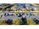 Aerial view of townhouses near a pond at 9746 Tiramasu Trl, Orlando, FL 32829