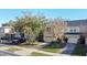 Two-story townhouse with attached garage at 9746 Tiramasu Trl, Orlando, FL 32829