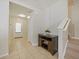 Light and airy foyer with tile floors and staircase at 9746 Tiramasu Trl, Orlando, FL 32829
