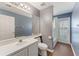 Clean bathroom with single vanity and tub shower combo at 1921 Nicholas Pl, St Cloud, FL 34771