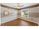 Bedroom with ceiling fan and two-toned walls at 1921 Nicholas Pl, St Cloud, FL 34771