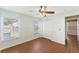 Bedroom with double door closet and ceiling fan at 1921 Nicholas Pl, St Cloud, FL 34771