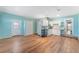 Efficient kitchenette with white cabinets and wood-look floors at 1921 Nicholas Pl, St Cloud, FL 34771
