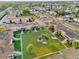 Aerial view of apartment community with green spaces and ample parking at 1000 Lake Of The Woods Blvd # 203E, Casselberry, FL 32730