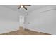 Spacious bedroom features wood-look floors, closet and a ceiling fan for comfort at 1000 Lake Of The Woods Blvd # 203E, Casselberry, FL 32730