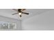 Bedroom with ceiling fan and window with blinds at 1000 Lake Of The Woods Blvd # 203E, Casselberry, FL 32730