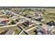 Aerial view of house with a big backyard and a white fence at 1317 Conch Key Ln, Davenport, FL 33837