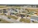 This aerial view of the neighborhood showcases a charming community with well-maintained landscaping at 1317 Conch Key Ln, Davenport, FL 33837