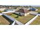 View of the backyard with a white fence and trees at 1317 Conch Key Ln, Davenport, FL 33837