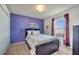 Bedroom with window, closet, curtains and carpeted floors at 1317 Conch Key Ln, Davenport, FL 33837