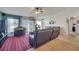Spacious open-concept living room featuring neutral walls and plenty of seating at 1317 Conch Key Ln, Davenport, FL 33837