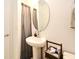 Simple bathroom with pedestal sink and shower at 1389 Captiva Cv # 20, Sanford, FL 32771