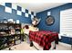 bedroom with red and black bedding at 1389 Captiva Cv # 20, Sanford, FL 32771