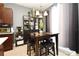Kitchen breakfast nook with table and four chairs at 1389 Captiva Cv # 20, Sanford, FL 32771