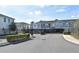 Gated entrance to River's Edge community featuring townhouses with modern design at 1389 Captiva Cv # 20, Sanford, FL 32771