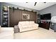 Living room with light beige sofa and an accent wall at 1389 Captiva Cv # 20, Sanford, FL 32771