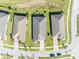 An aerial view showcases this homes roof, landscaping and positioning on the street at 1511 Goblet Cove St, Kissimmee, FL 34746