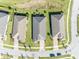 An aerial view showcases this homes roof, landscaping and positioning on the street at 1511 Goblet Cove St, Kissimmee, FL 34746