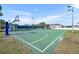 Outdoor basketball court featuring adjustable hoops and lighting for fun day or night at 1511 Goblet Cove St, Kissimmee, FL 34746
