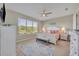 Serene main bedroom featuring soft decor, natural light, and a calming color palette at 1511 Goblet Cove St, Kissimmee, FL 34746