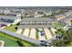 Aerial view showcasing townhouses, individual garages, and a corner lot location at 15508 Blackbead St, Winter Garden, FL 34787