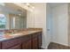 Double vanity bathroom with granite countertop and shower at 15508 Blackbead St, Winter Garden, FL 34787