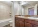 Bathroom with double vanity, neutral color scheme, and shower/tub at 15508 Blackbead St, Winter Garden, FL 34787