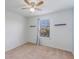 Charming bedroom with ceiling fan and window coverings at 15508 Blackbead St, Winter Garden, FL 34787