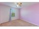 Bright bedroom featuring light pink walls and a ceiling fan at 15508 Blackbead St, Winter Garden, FL 34787