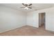 Bright bedroom featuring a ceiling fan and plush carpeting at 15508 Blackbead St, Winter Garden, FL 34787