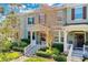 Two-story townhome with front porch and landscaping at 15508 Blackbead St, Winter Garden, FL 34787