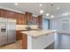Modern kitchen with island, stainless steel appliances at 15508 Blackbead St, Winter Garden, FL 34787
