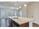 Kitchen island with double sink and dishwasher at 15508 Blackbead St, Winter Garden, FL 34787