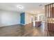 Open living room with tile floors and accent wall at 15508 Blackbead St, Winter Garden, FL 34787