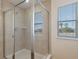 Large walk-in shower with glass enclosure at 15508 Blackbead St, Winter Garden, FL 34787